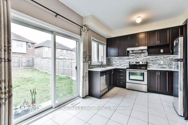 Photo 7 of 104 Evershot Crescent, Markham, Wismer — HOMEH