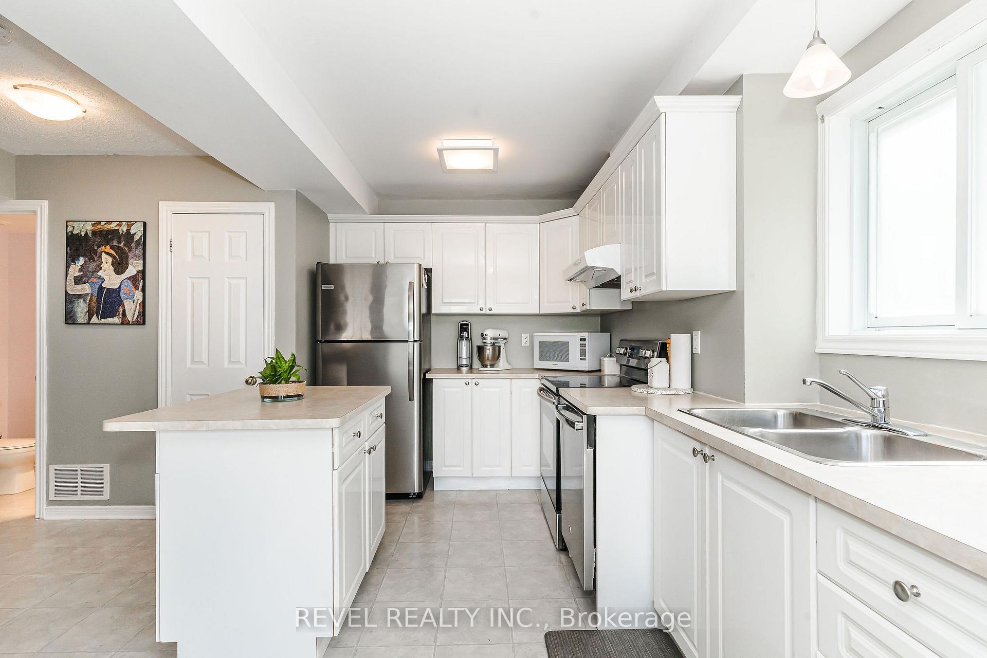 Photo 6 of 65 Dancy Drive, Orillia — HOMEH