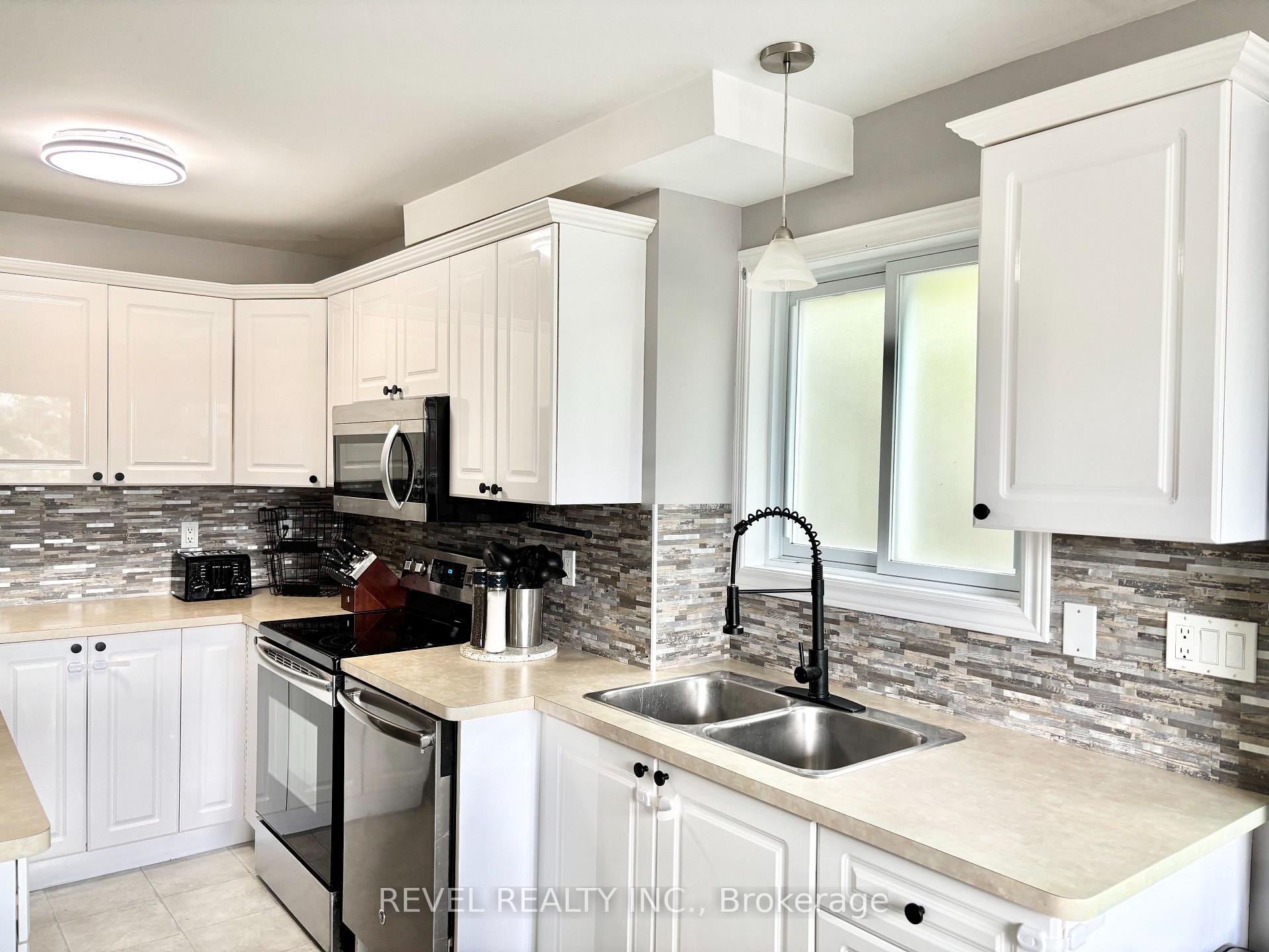 Photo 7 of 65 Dancy Drive, Orillia — HOMEH