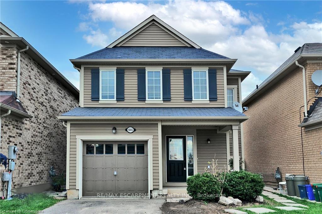 Front of Unit Main/upper, 1005 Farmstead Drive