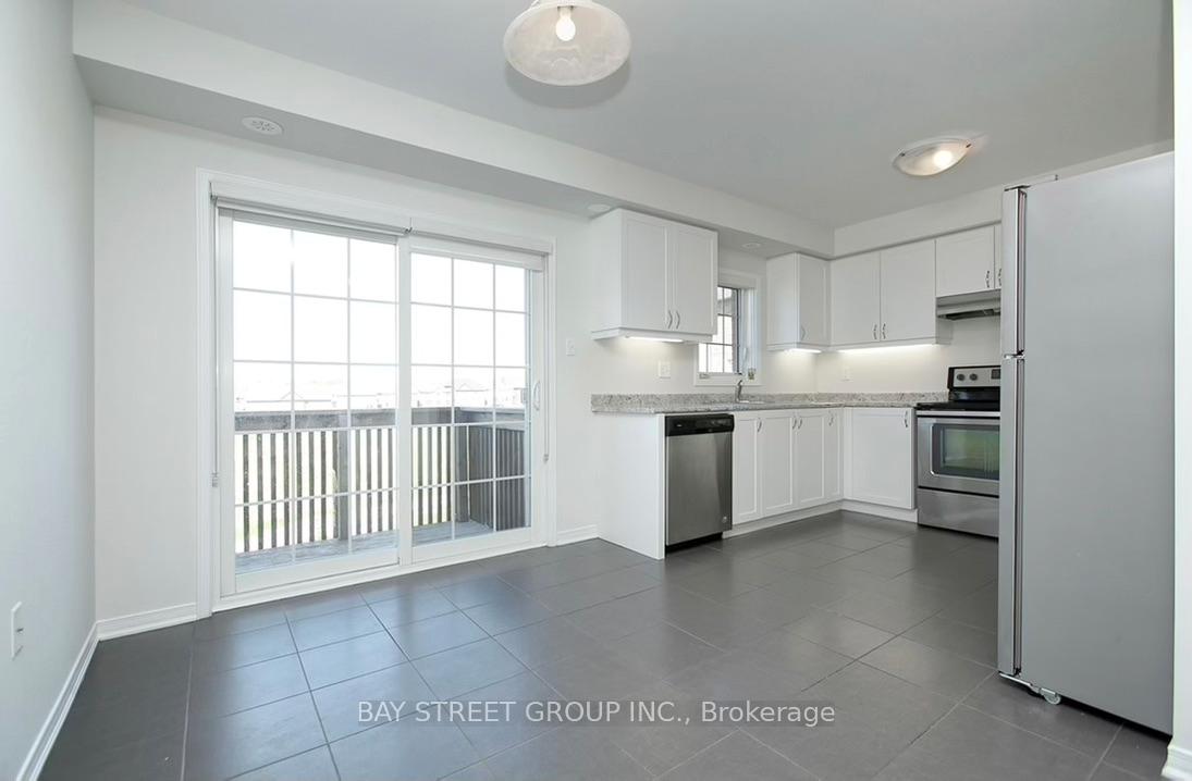 Photo 4 of Unit 37, 2490 Bromus Path, Oshawa, Windfields — HOMEH