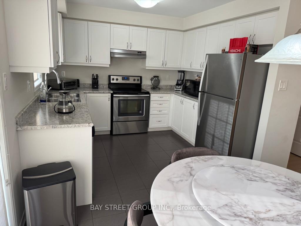 Photo 5 of Unit 37, 2490 Bromus Path, Oshawa, Windfields — HOMEH