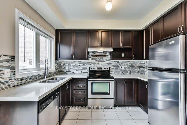 Photo 9 of 104 Evershot Crescent, Markham, Wismer — HOMEH