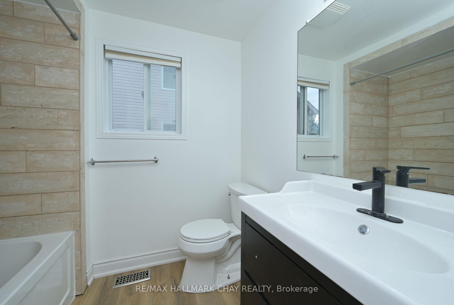 Photo 2 of 24 Stoneham Street, New Tecumseth, Alliston — HOMEH