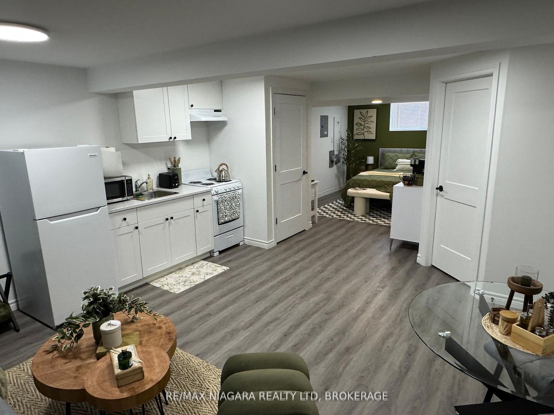 Photo 1 of Unit 4 Lower, 8196 McLeod Road, Niagara Falls, Brown — HOMEH