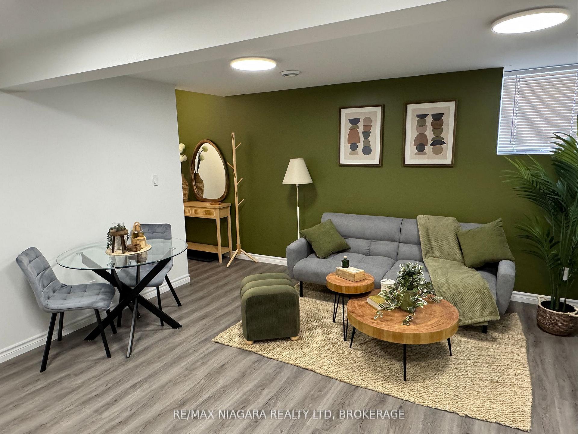 Photo 2 of Unit 4 Lower, 8196 McLeod Road, Niagara Falls, Brown — HOMEH