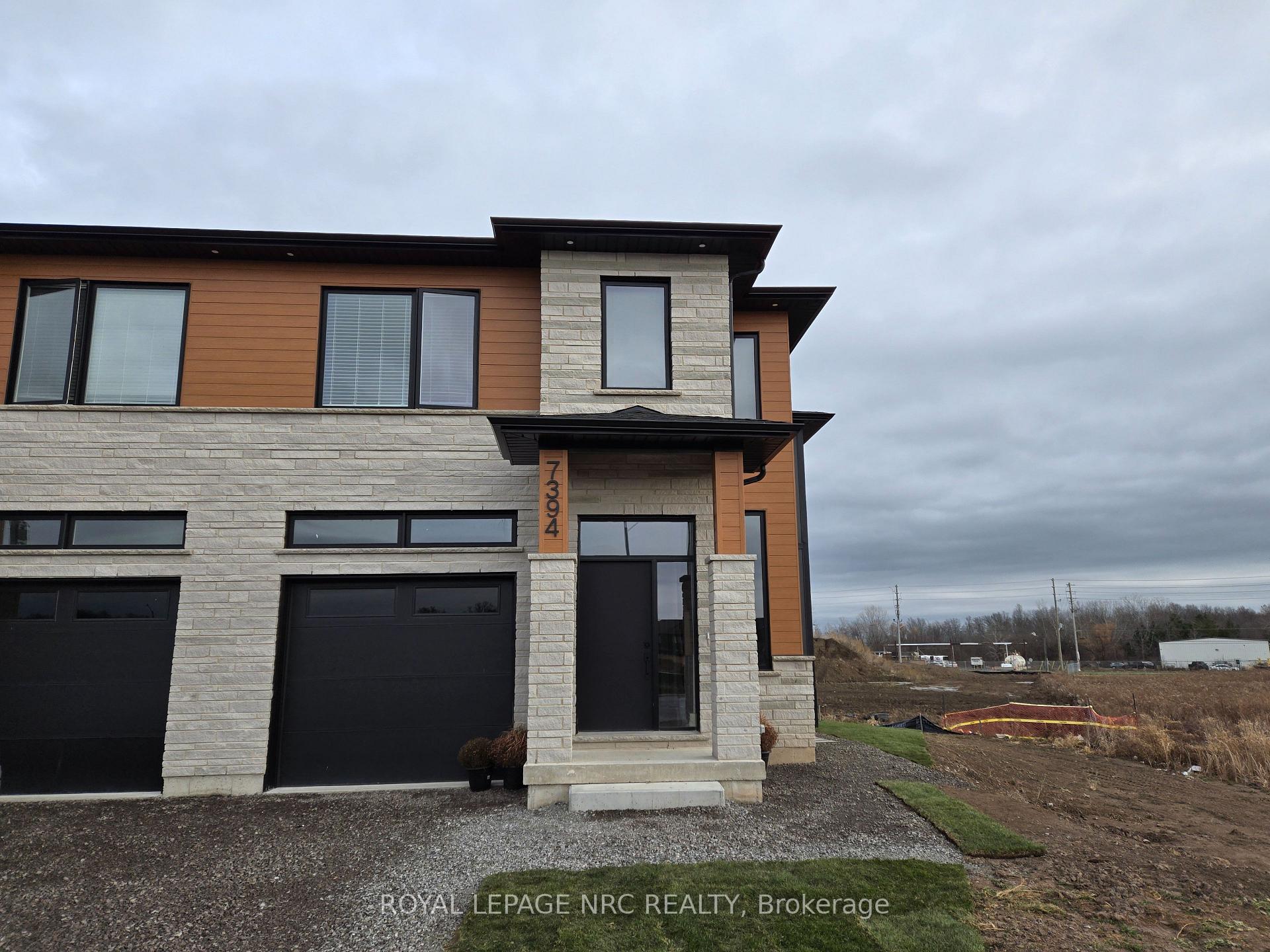 Front of Unit Upper, 7394 Splendour Drive