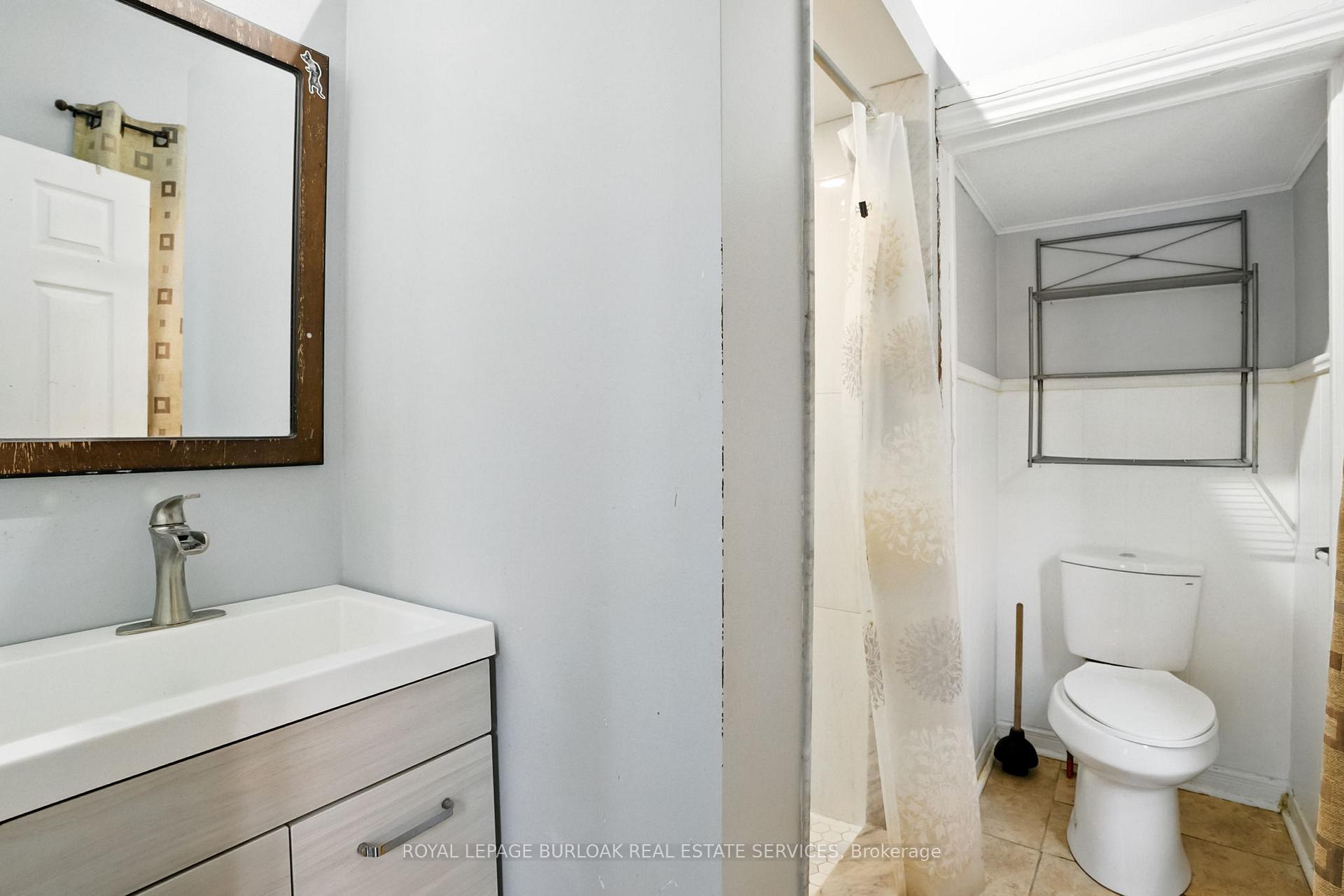 Photo 23 of 191 Simcoe Street S, Oshawa, Central — HOMEH