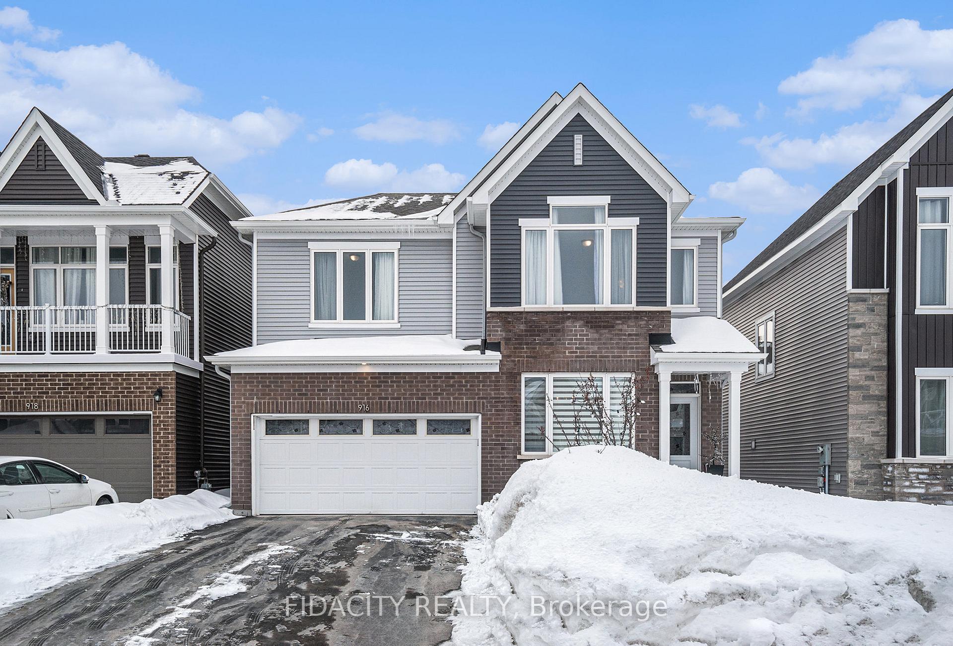 Front of 916 Lesage Way