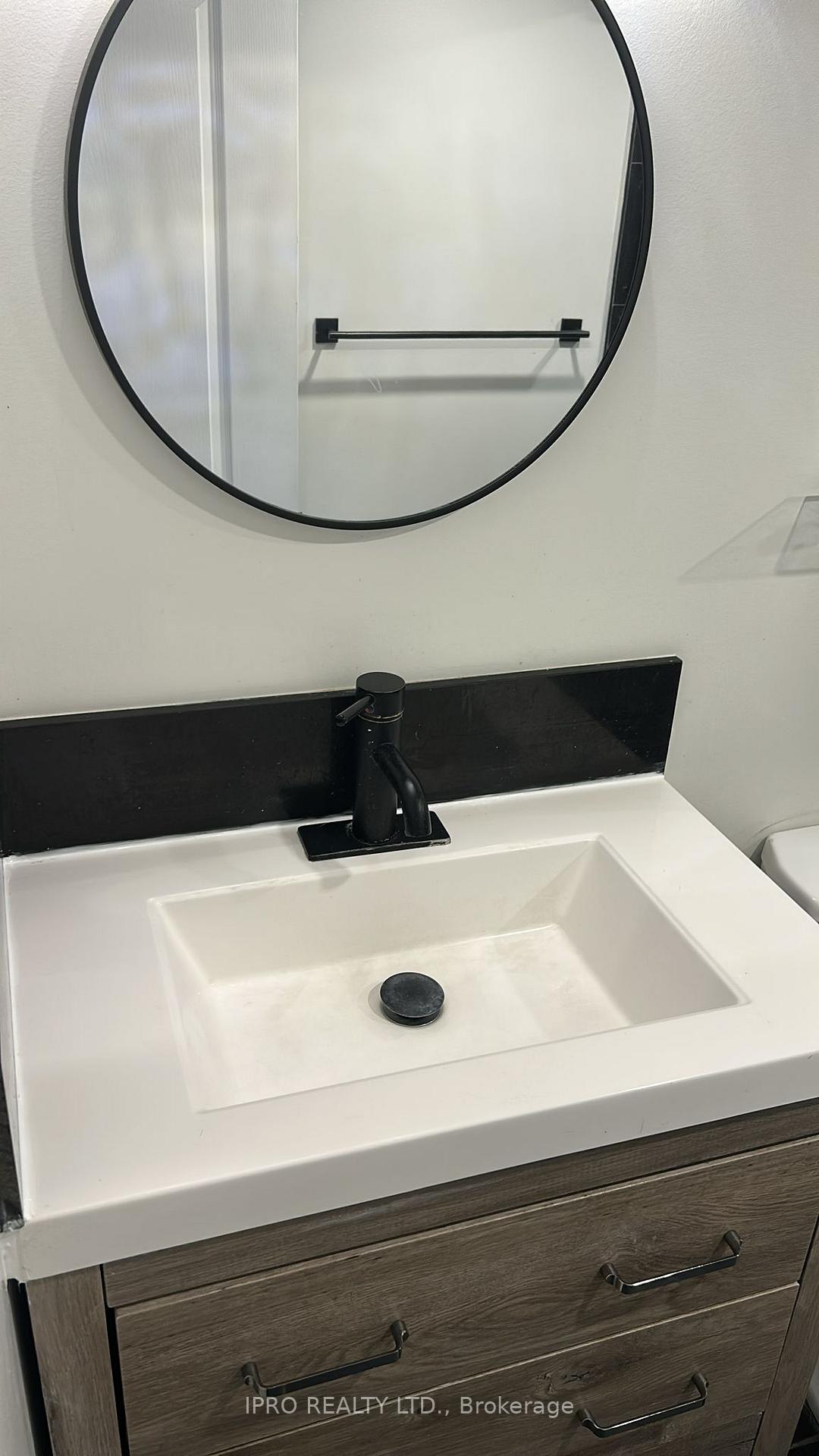 Photo 10 of Unit Bsmt, 701 Aspen Terrace, Milton, Cobban — HOMEH