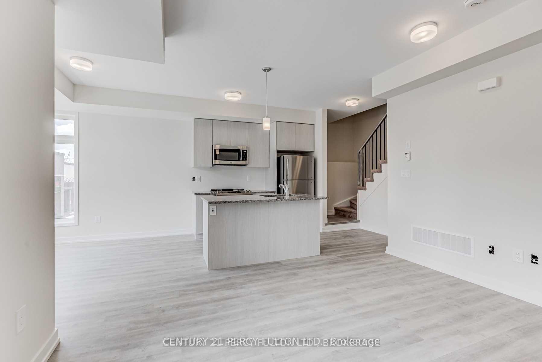 Photo 5 of Unit 105, 2550 Castlegate Crossing Drive, Pickering, Duffin Heights — HOMEH