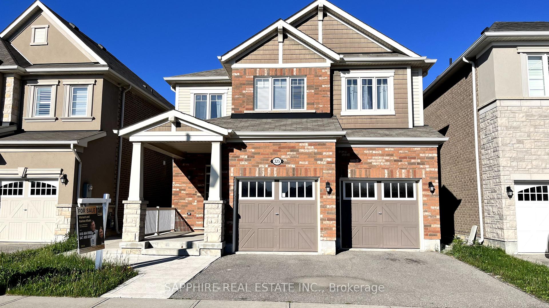 Front of 325 Trudeau Drive E