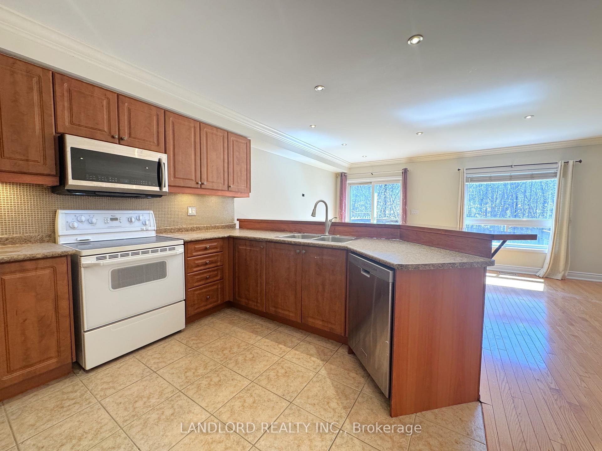 Photo 2 of Unit 33, 620 Ferguson Drive, Milton, Beaty — HOMEH