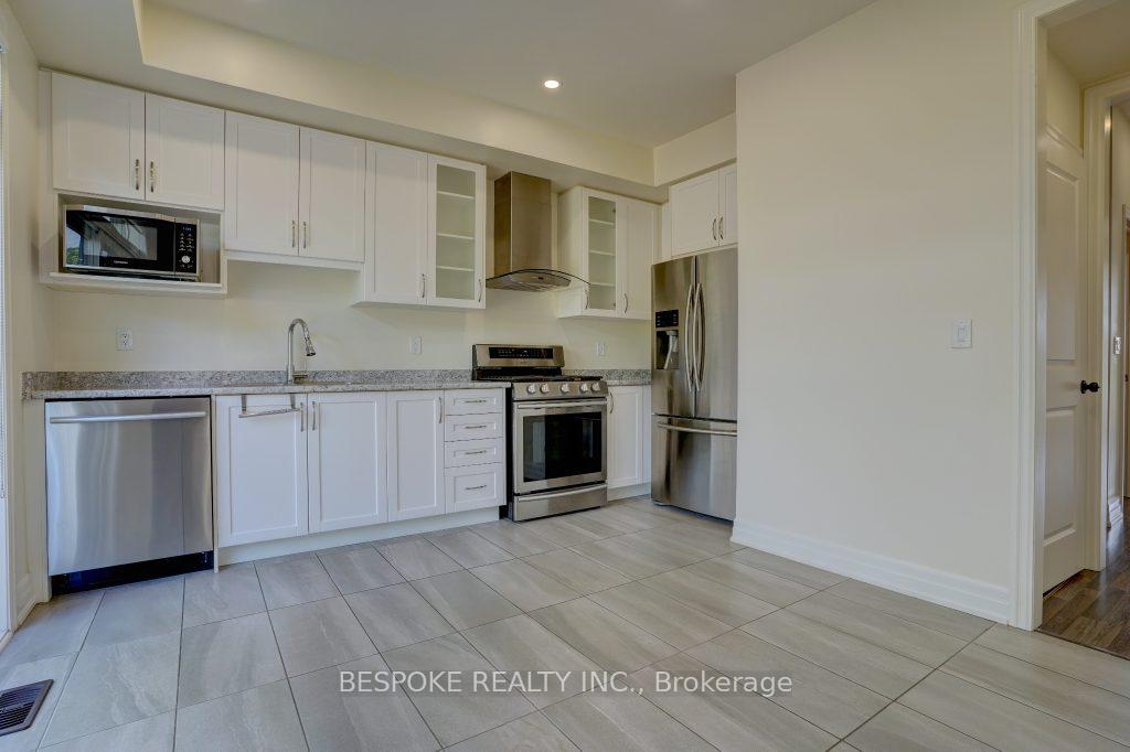 Photo 11 of Unit 36, 384 Arctic Red Drive, Oshawa, Windfields — HOMEH