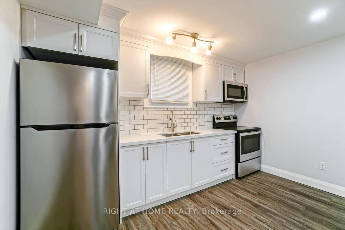 Photo 4 of Unit Unit 3, 865 Simcoe Street S, Oshawa, Lakeview — HOMEH