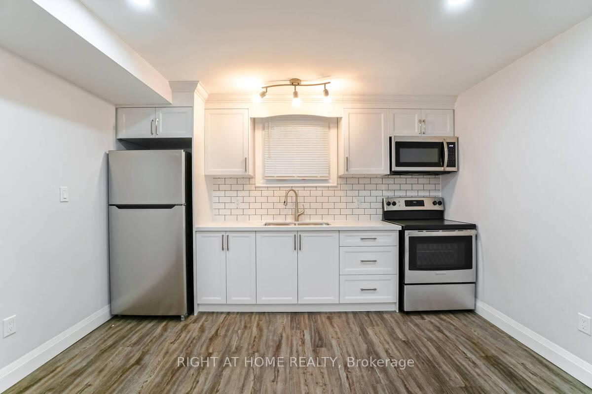 Photo 5 of Unit Unit 3, 865 Simcoe Street S, Oshawa, Lakeview — HOMEH