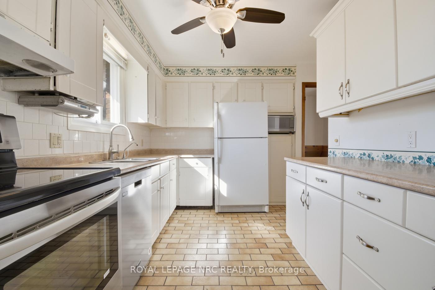 Photo 10 of 69 Elmvale Crescent, Port Colborne, Main Street — HOMEH