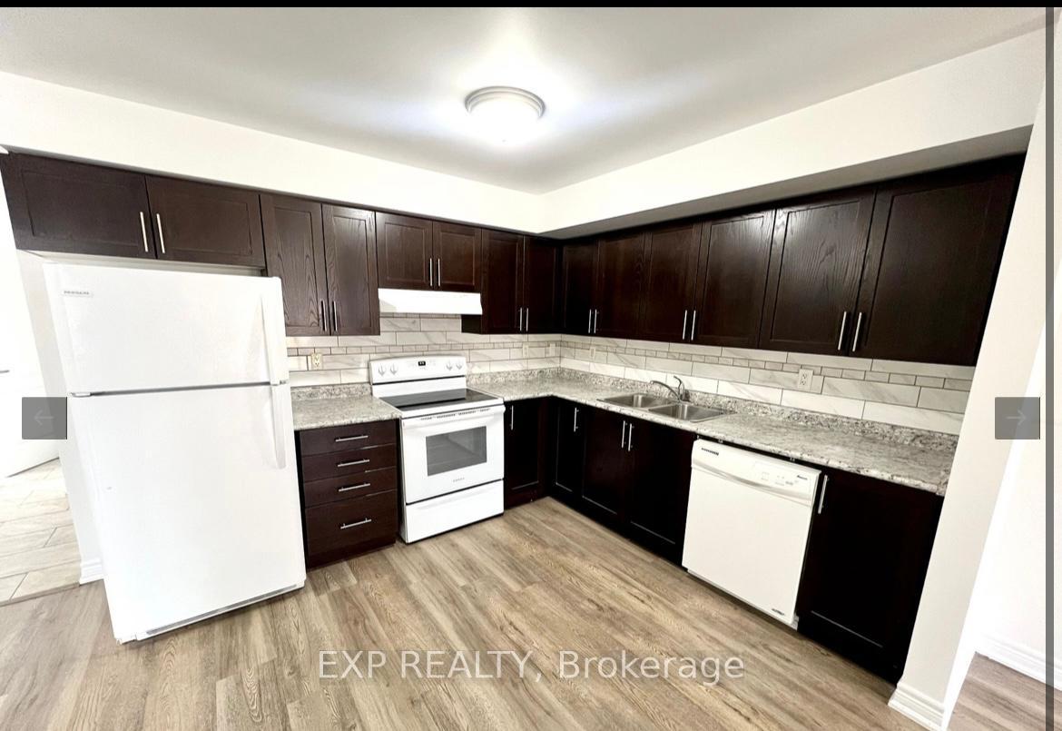 Photo 5 of Unit Main, 144 Capreol Court, Oshawa, Vanier — HOMEH