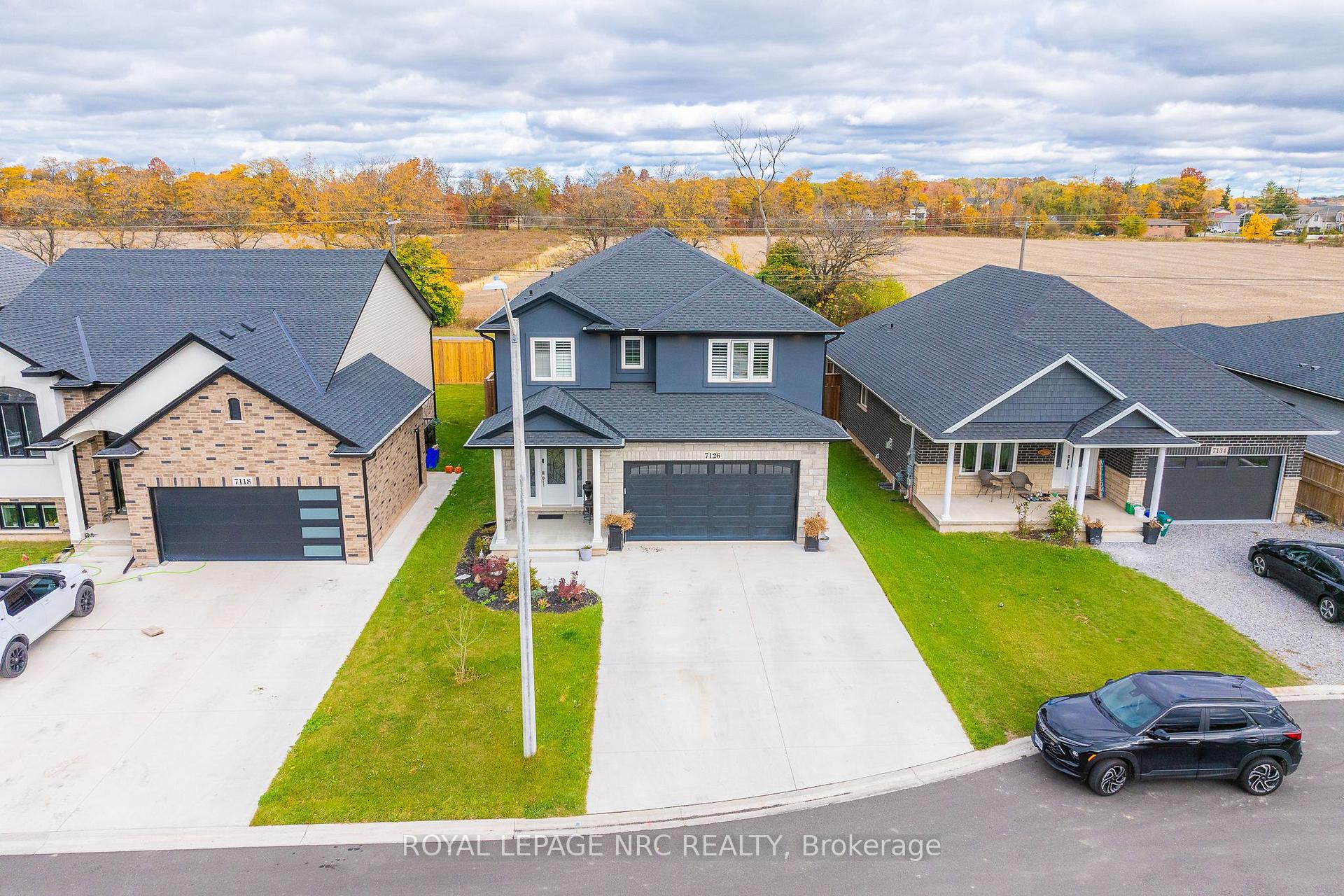 Photo 4 of 7126 Parsa Street, Niagara Falls, Brown — HOMEH