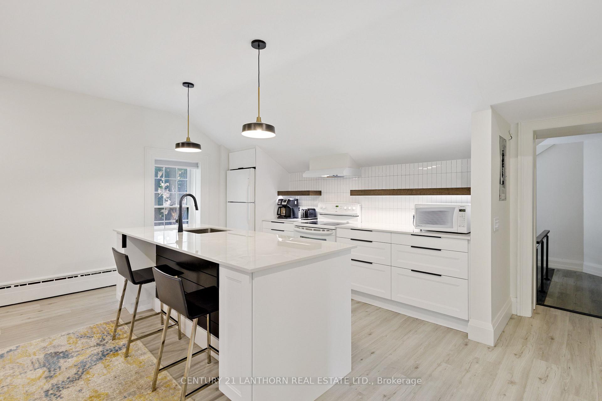 Photo 5 of Unit UNIT 2, 344 Main Street, Prince Edward County, Picton Ward — HOMEH