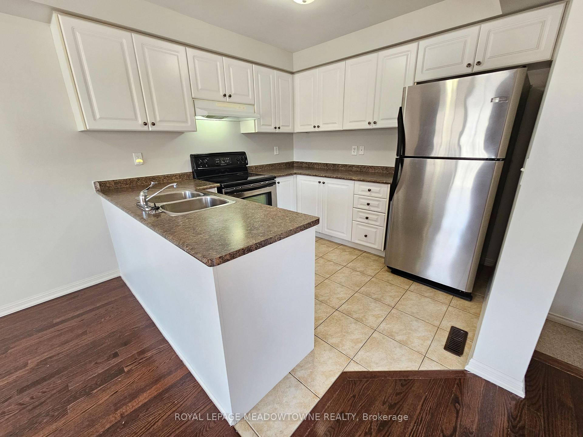 Photo 10 of Unit 9, 620 Ferguson Drive, Milton, Beaty — HOMEH