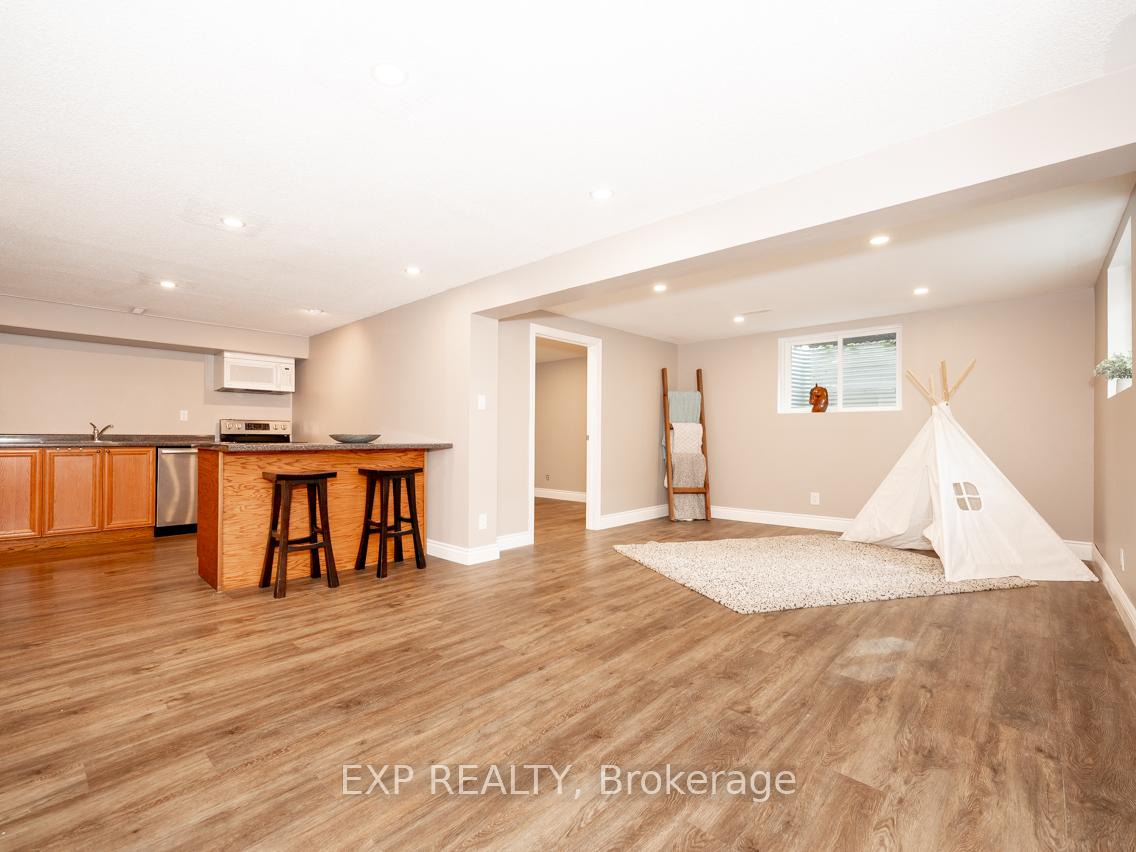 Photo 4 of Unit [Bsmt], 785 Frobisher Boulevard, Milton, Dorset Park — HOMEH