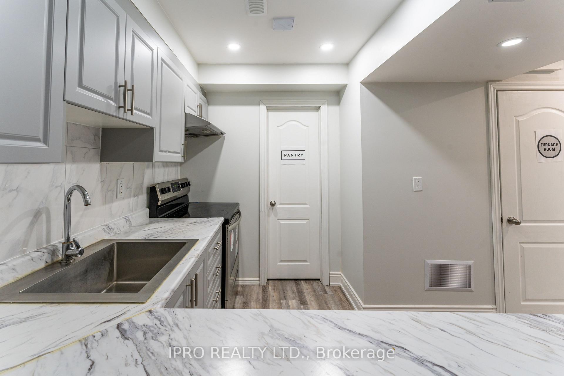 Photo 4 of Unit BSMT, 1558 Kovachik Boulevard, Milton, Walker — HOMEH