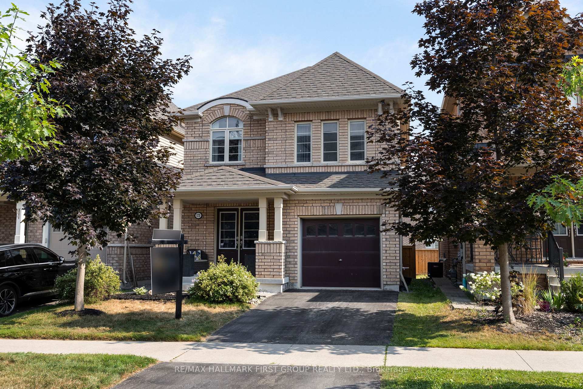 Front of 173 Windfields Farm Drive W