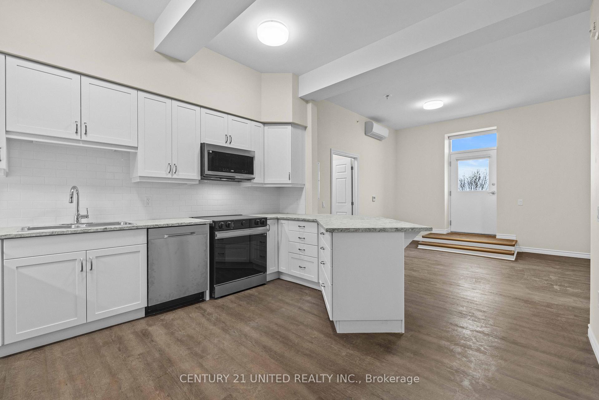 Photo 2 of Unit C306, 1545 Monaghan Road, Peterborough, Town Ward 3 — HOMEH