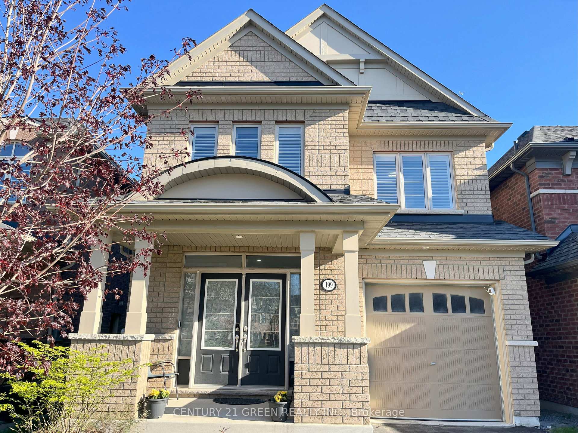 Front of 199 Windfields Farm Drive W
