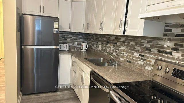 Photo 3 of Unit 201, 1160 Simcoe Street S, Oshawa, Lakeview — HOMEH
