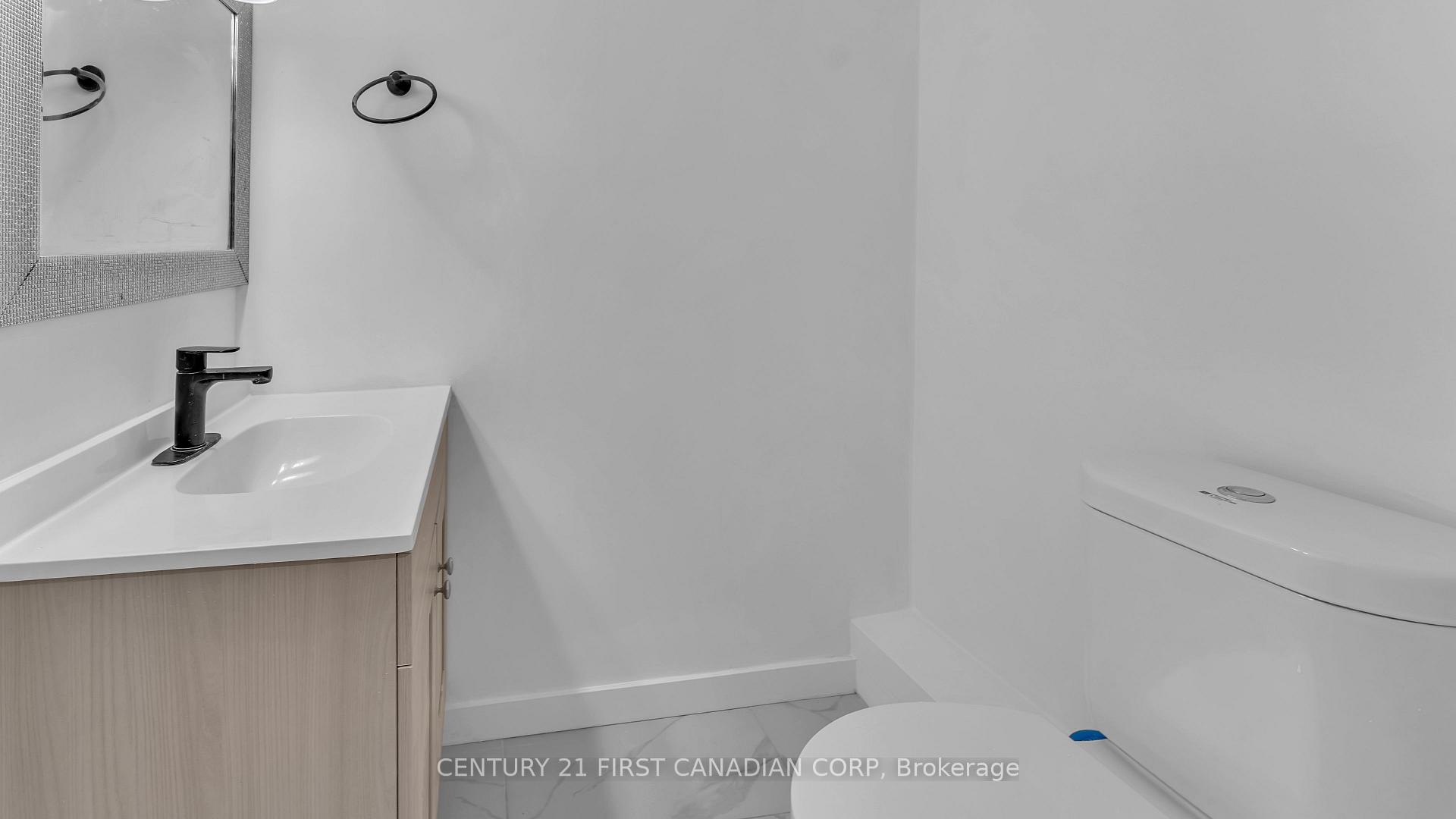 Photo 4 of Unit 2, 413 Main Street S, South Huron, Exeter — HOMEH