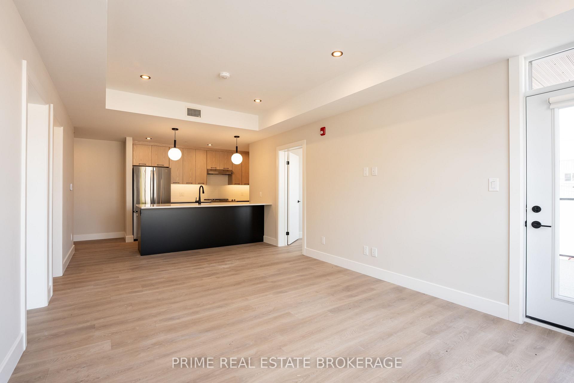 Photo 5 of Unit 301, 15 James Street E, South Huron, Exeter — HOMEH