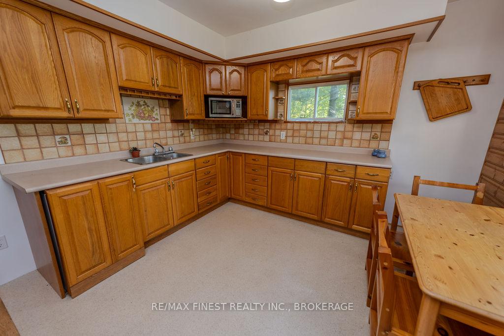 Photo 6 of Unit E, 2305 Opinicon Road E, Rideau Lakes, Rideau Lakes (South Crosby) Twp — HOMEH