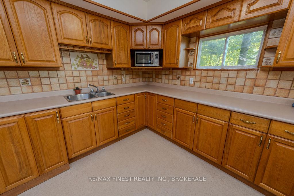 Photo 7 of Unit E, 2305 Opinicon Road E, Rideau Lakes, Rideau Lakes (South Crosby) Twp — HOMEH
