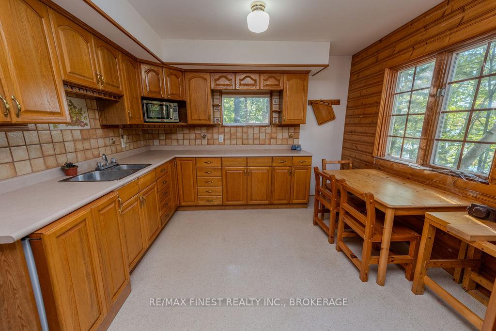 Photo 8 of Unit E, 2305 Opinicon Road E, Rideau Lakes, Rideau Lakes (South Crosby) Twp — HOMEH
