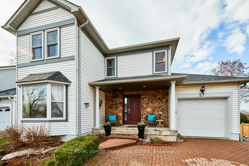 Front of 27 Poplar Park Crescent N