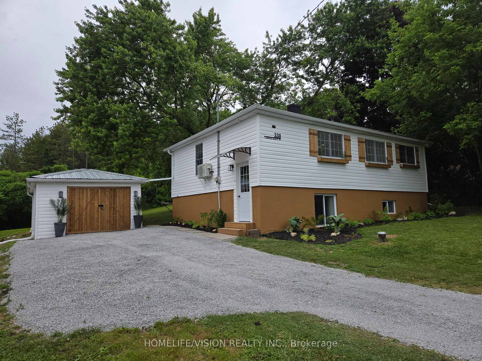 Photo 1 of 338 Carnegie Beach Road, Scugog, Rural Scugog — HOMEH