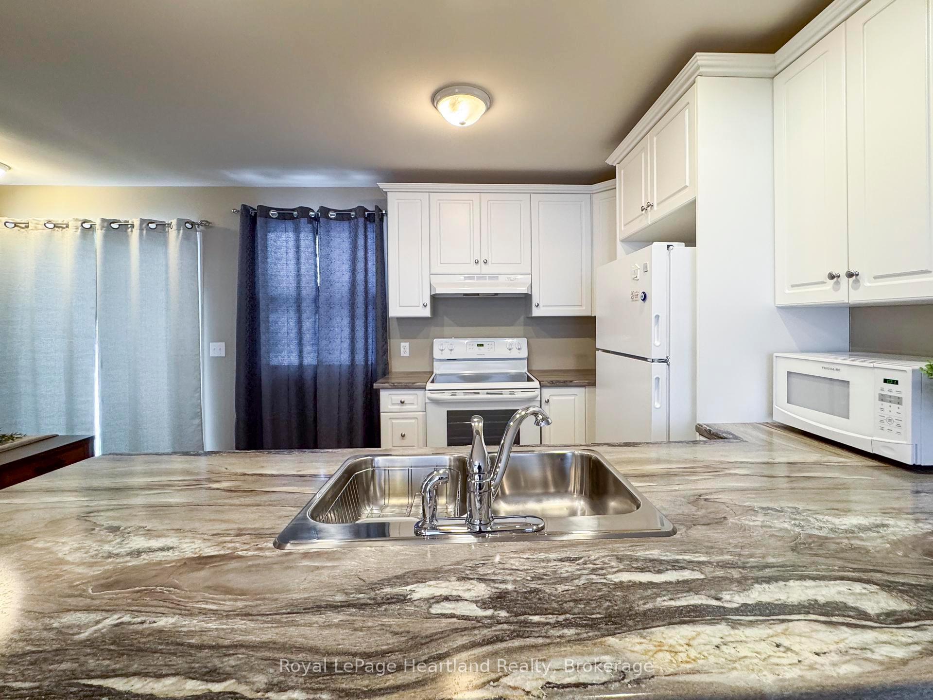 Photo 11 of 126 Sanders Street E, South Huron, Exeter — HOMEH