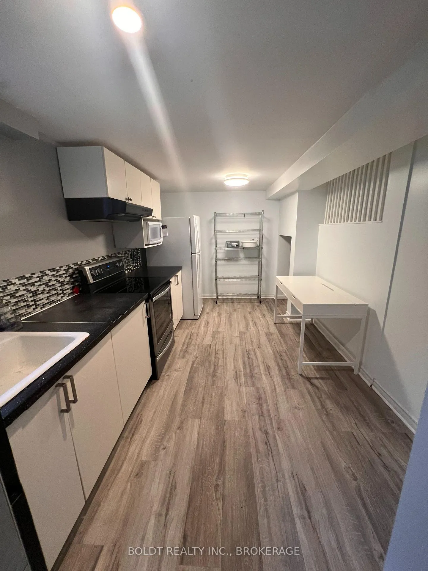 Photo 5 of Unit Lower, 18 Myrtle Avenue, St. Catharines, Carlton/Bunting — HOMEH