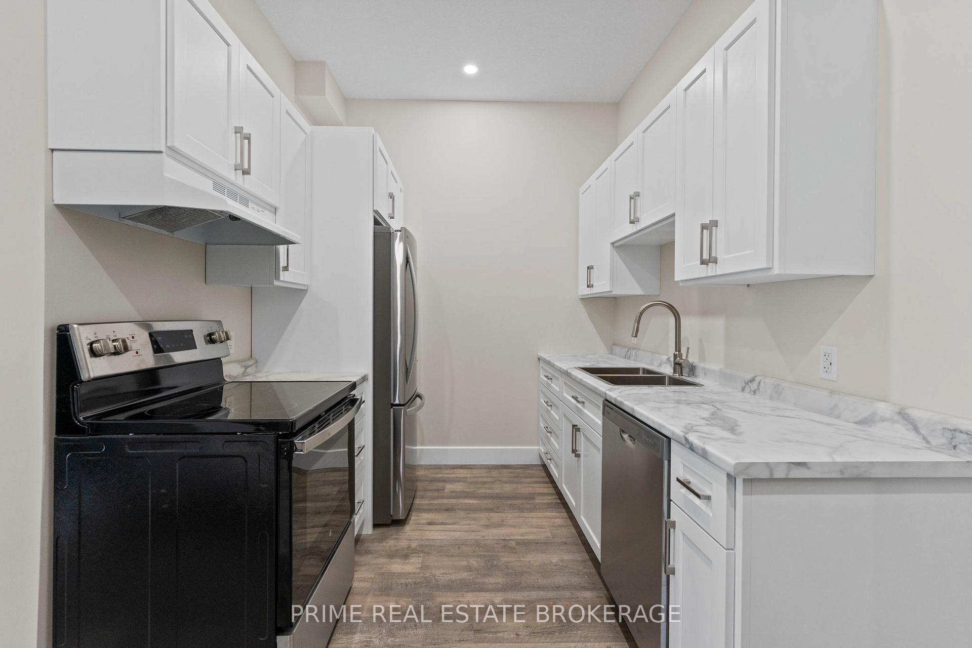 Photo 10 of Unit 5, 539 Talbot Street, St. Thomas — HOMEH