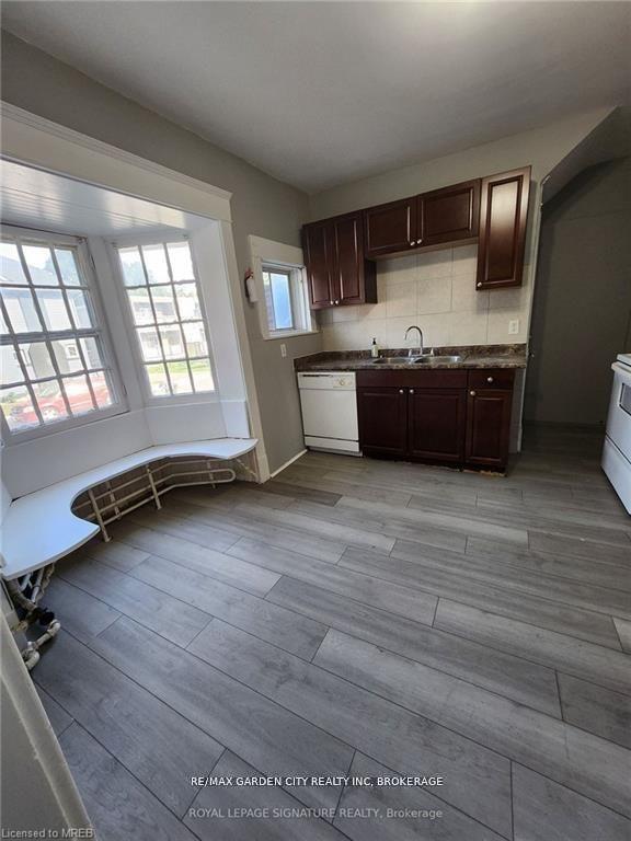 Photo 6 of Unit 1, 323 Queenston Street, St. Catharines, E. Chester — HOMEH