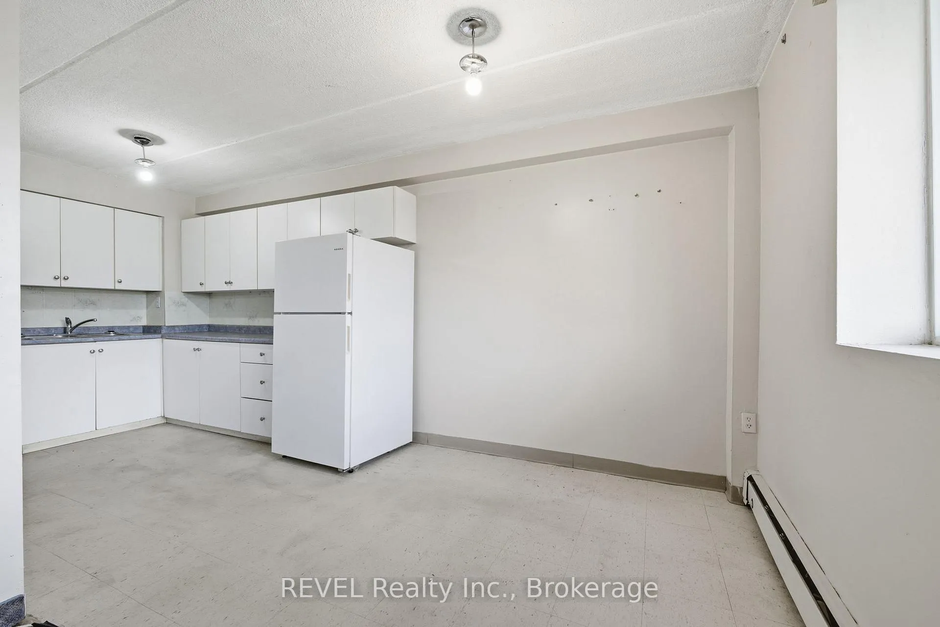 Photo 7 of Unit 101, 19 Manchester Avenue, St. Catharines, Haig — HOMEH