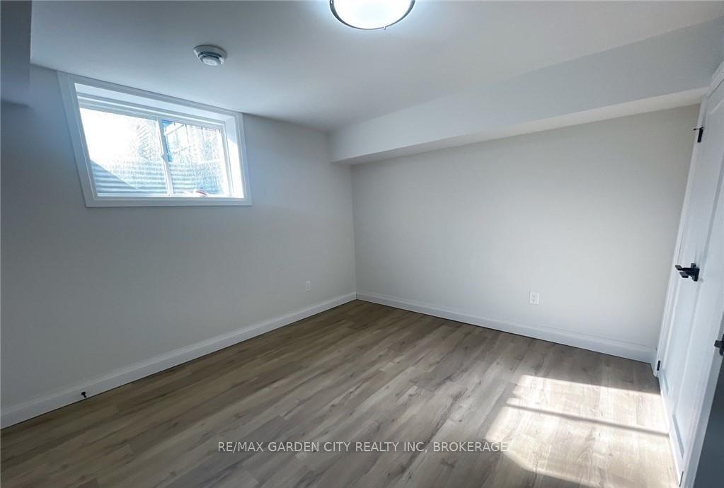 Photo 5 of Unit 4-LOWER LEVEL, 13 Valley Road, St. Catharines, Western Hill — HOMEH