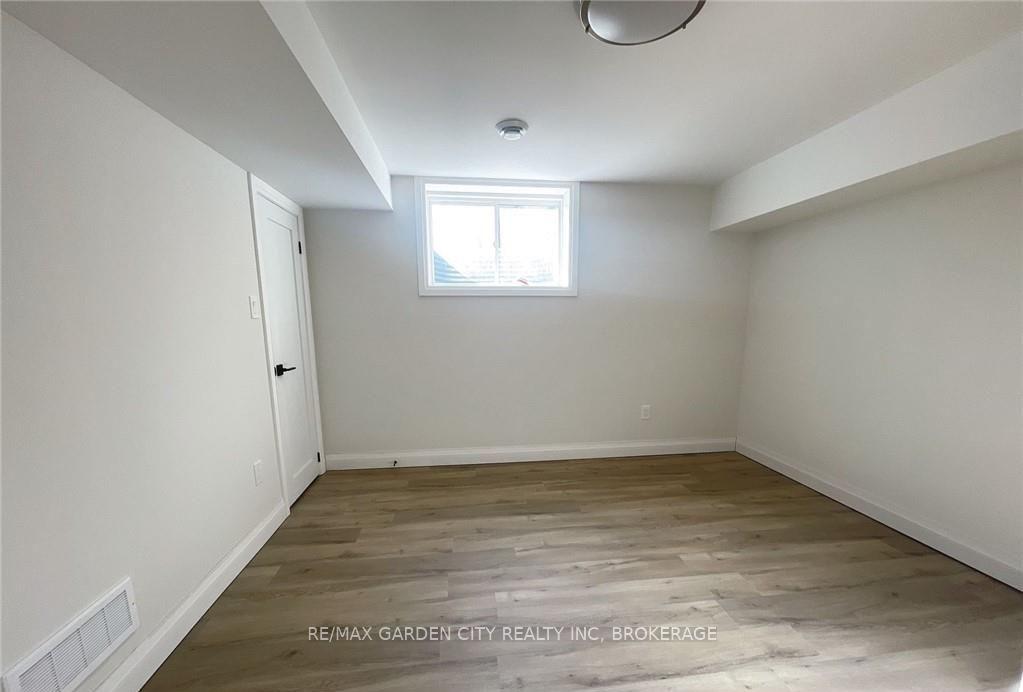 Photo 7 of Unit 4-LOWER LEVEL, 13 Valley Road, St. Catharines, Western Hill — HOMEH
