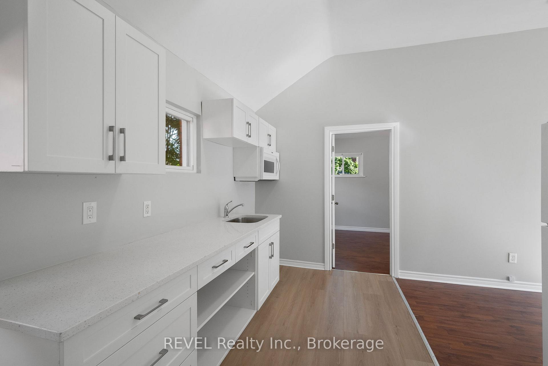 Photo 6 of Unit Unit 2, 166 James Street, St. Catharines, Downtown — HOMEH