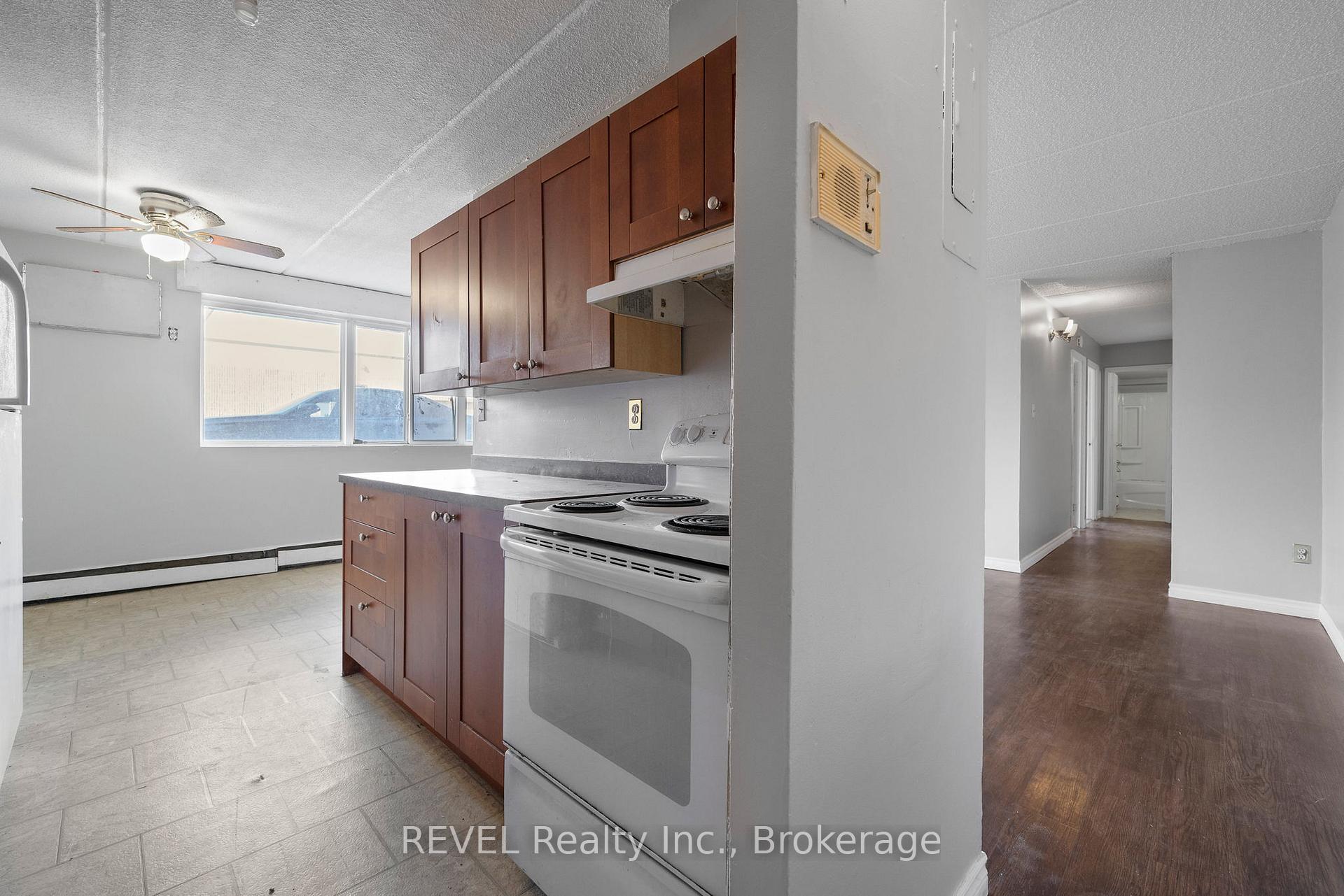 Photo 3 of Unit 102, 19 Manchester Avenue, St. Catharines, Haig — HOMEH