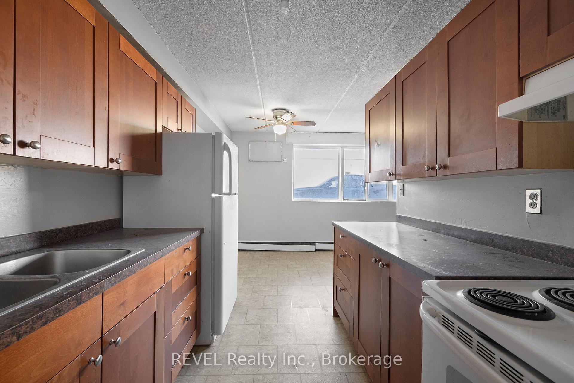 Photo 4 of Unit 102, 19 Manchester Avenue, St. Catharines, Haig — HOMEH