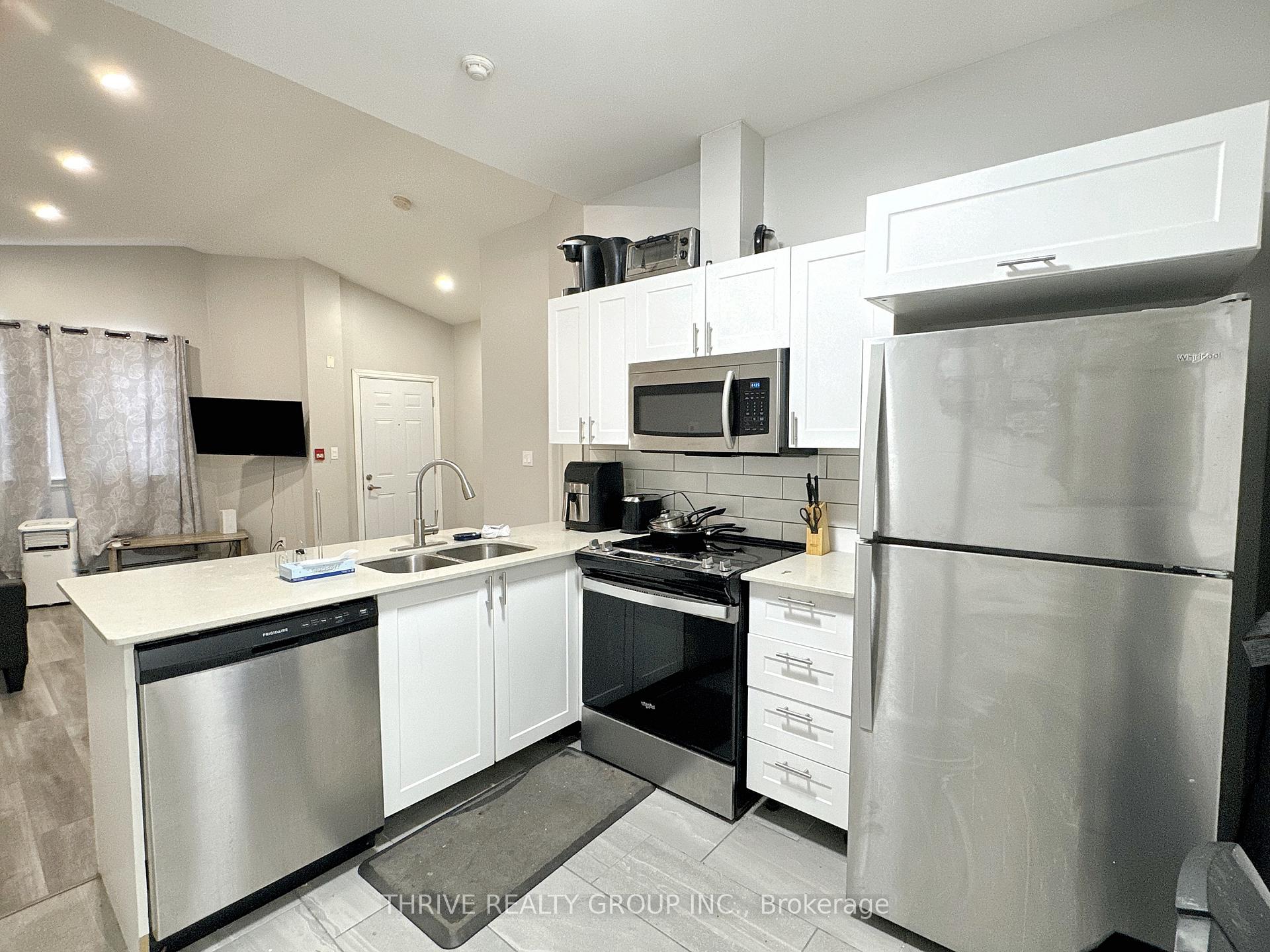 Photo 2 of Unit 4, 268 Talbot Street, St. Thomas — HOMEH