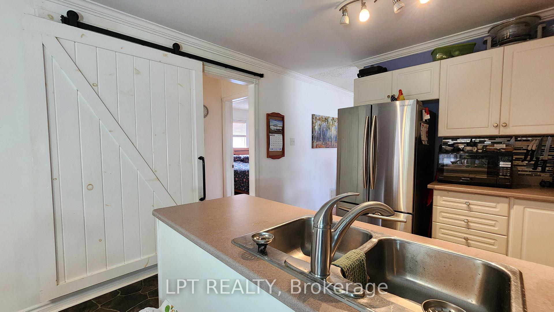 Photo 10 of 69 Simcoe Street, Springwater, Elmvale — HOMEH